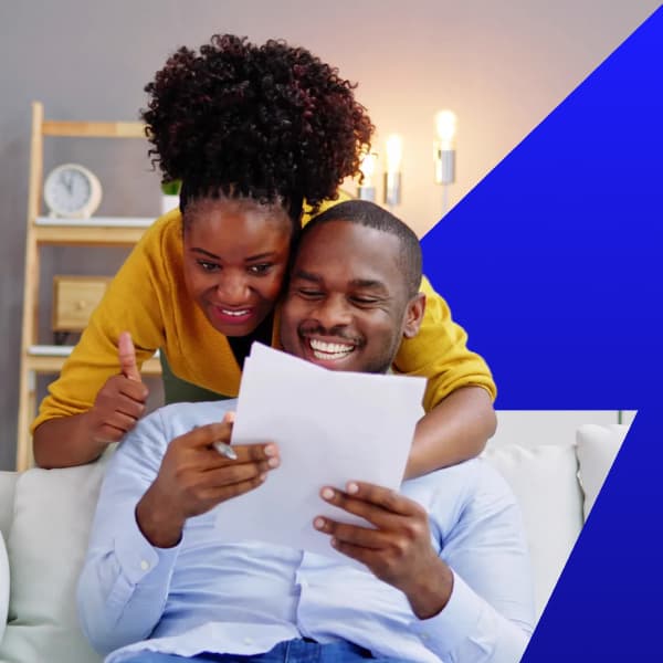 Couple reviewing energy documents at home