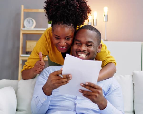 Family reviewing energy savings with solar