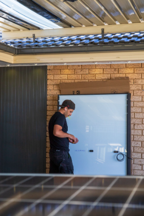 Solar Battery Group accredited installer completing a battery installation on an Australian home